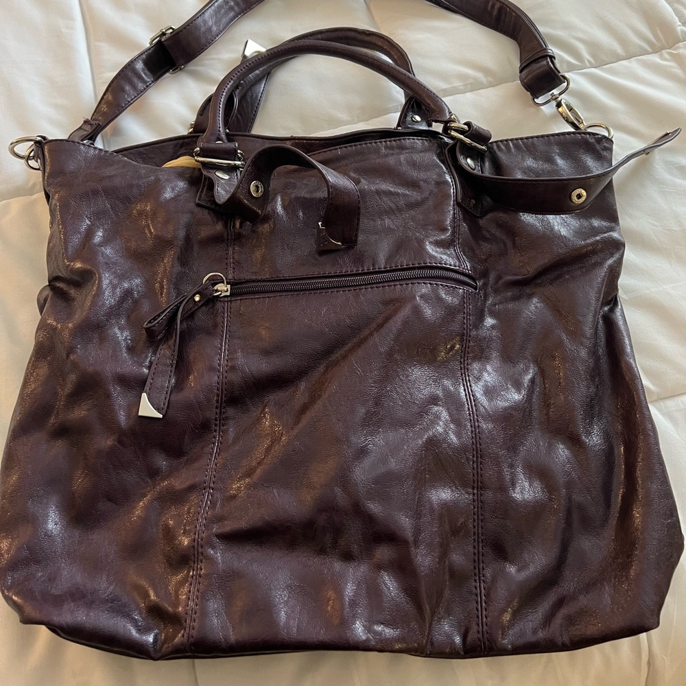 Large tote bag. Brand unknown. Eggplant color with tan lining on inside